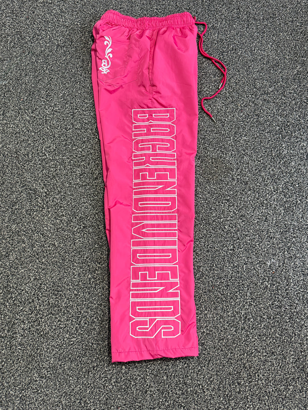 BACKEND NYLON WINDBREAKER PANTS