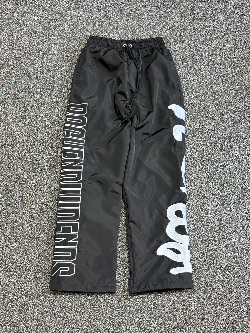 BACKEND NYLON WINDBREAKER PANTS